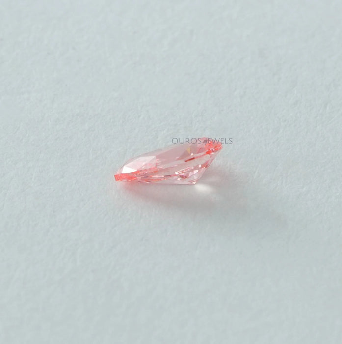 side view of 0.31 carat pink tear drop loose lab created diamonds