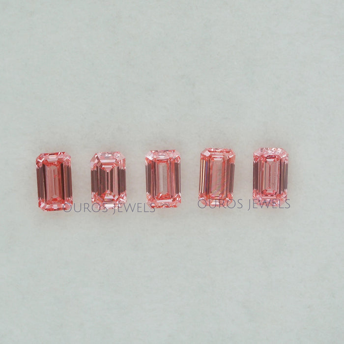 front view of pink elongated emerald cut lab grown diamonds loose