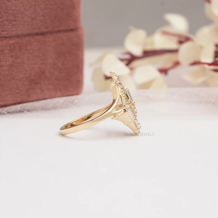side view of baguette and round-cut lab diamond chevron wedding band on fabric