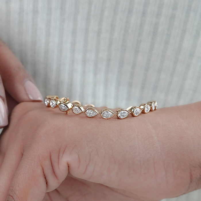 Bezel Set Pear Cut East West Set Tennis Bracelet