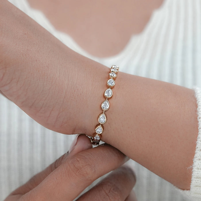 Bezel Set Pear Cut East West Set Tennis Bracelet