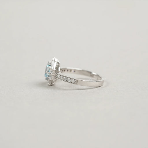 side view of fancy blue asscher-cut lab diamond halo colored engagement ring