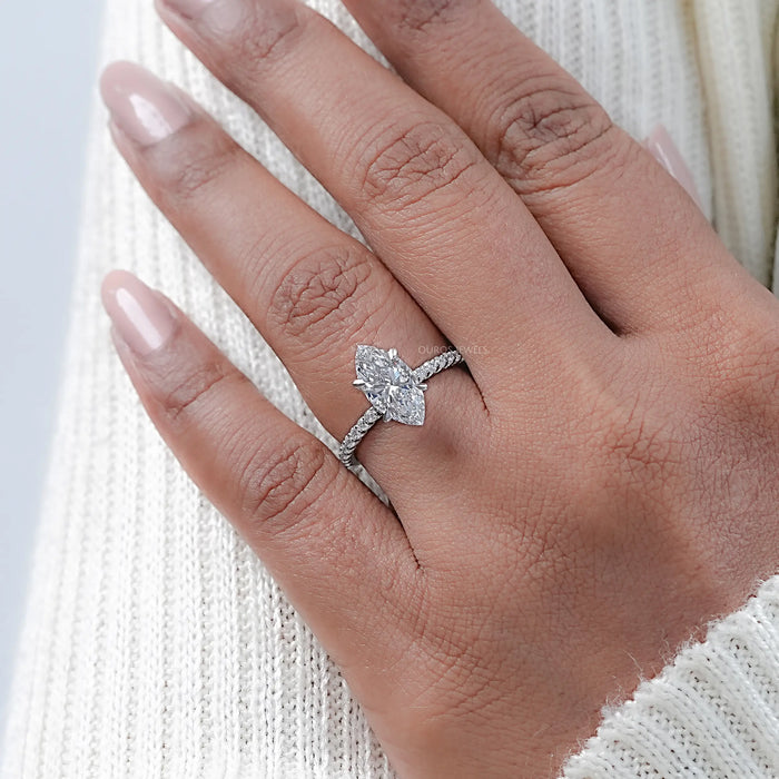 marquise-cut lab diamond solitaire hidden halo engagement ring on model's finger