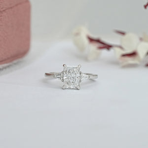 Brilliant Radiant Cut And Tapered Baguette Three stone ring