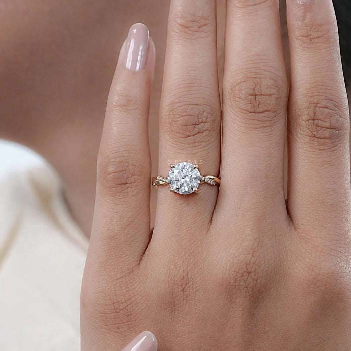 twisted round-cut lab diamond solitaire accent anniversary ring in finger