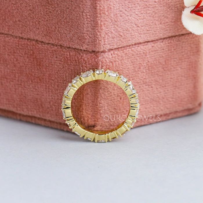 yellow gold oval cut eternity band 