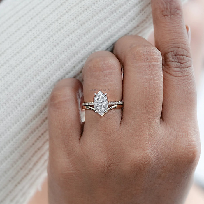 dutch marquise-cut diamond curved engagement ring with 2 yellow bands in finger