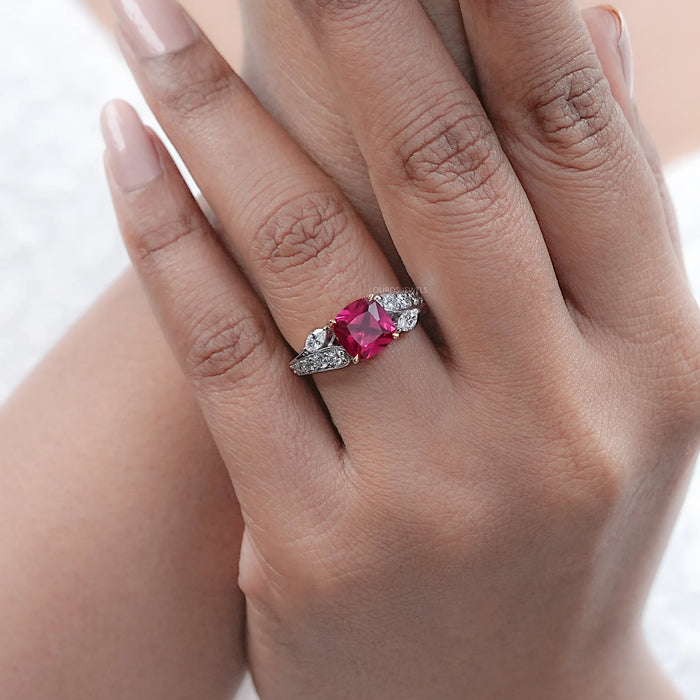 pink ruby cushion cut gemstone solitaire split-shank wedding ring on model's finger