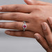 cushion cut red ruby halo split shank engagement ring in finger