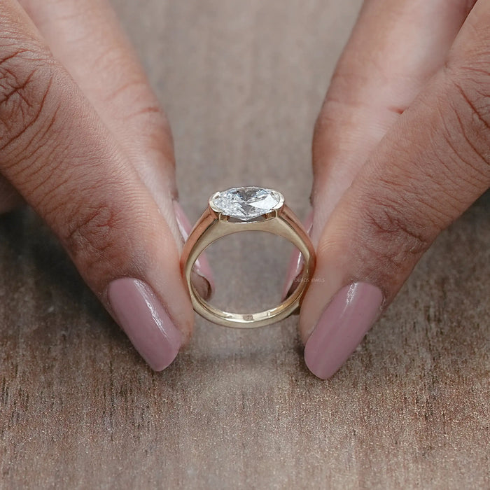East West Oval Cut Half Bezel Engagement Ring
