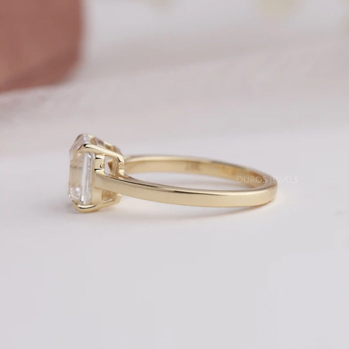 emerald cut diamond cathedral ring