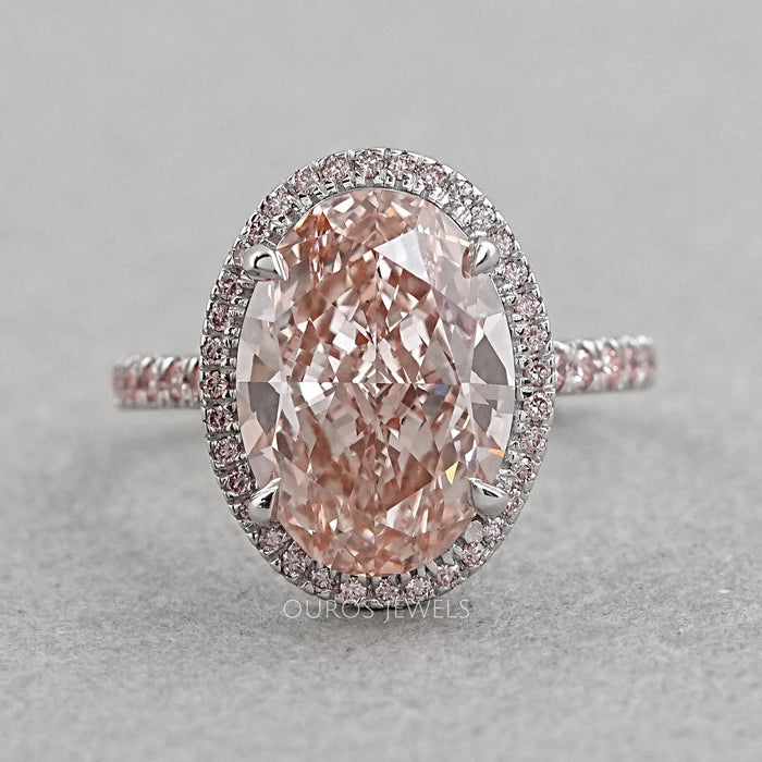 front view of fancy pink oval cut lab diamond halo engagement ring