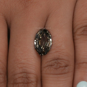 Oval Step Cut Cut Loose Lab Grown Diamond on Hand