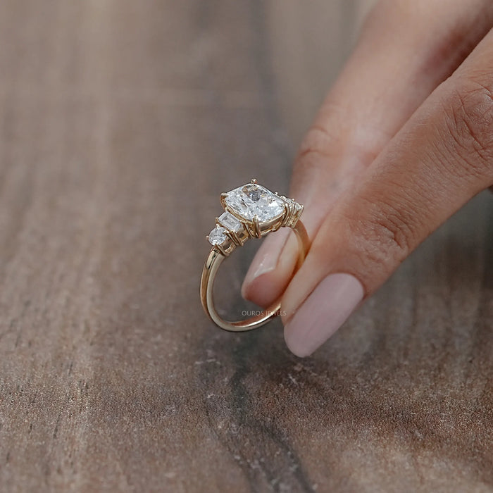 side view of elongated cushion and baguette cut diamond five stone wedding ring