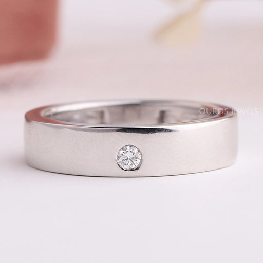 front view of solitaire round shape flush set wedding band single diamond ring
