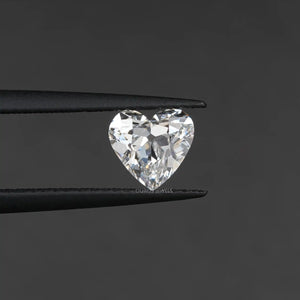 Beautifull Old Mine Heart Cut Lab Grown Diamond holded with tweezer