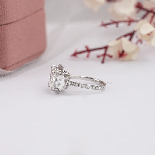 side view of square radiant cut diamond with halo accent three stone ring