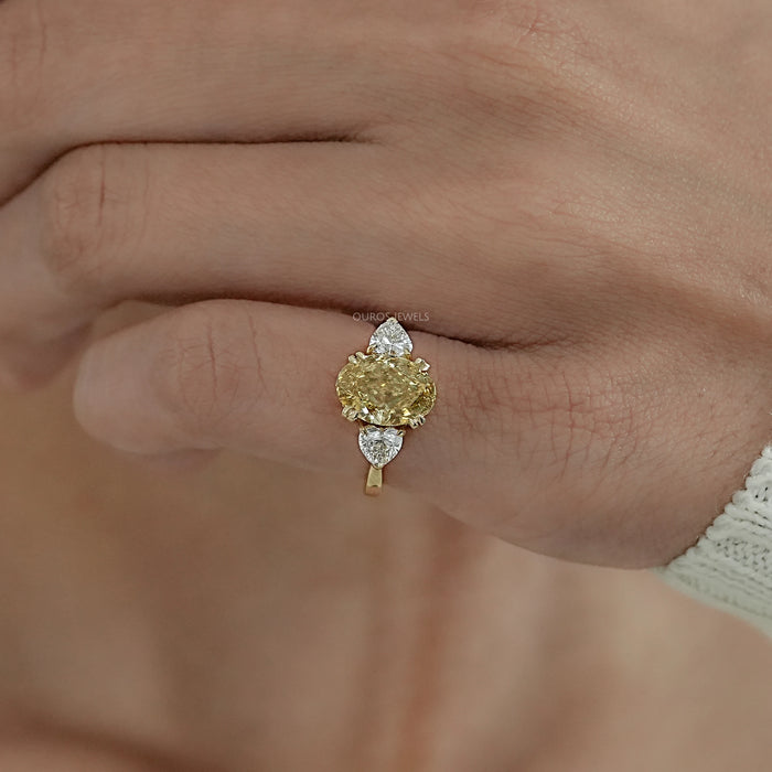 Fancy Vivid Yellow Oval Cut Hidden Halo Three Stone Ring