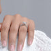 certified heart-shaped lab diamond solitaire accent wedding ring on model's finger