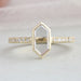 front view of hexagon long portrait cut diamond bezel set solitaire wedding ring