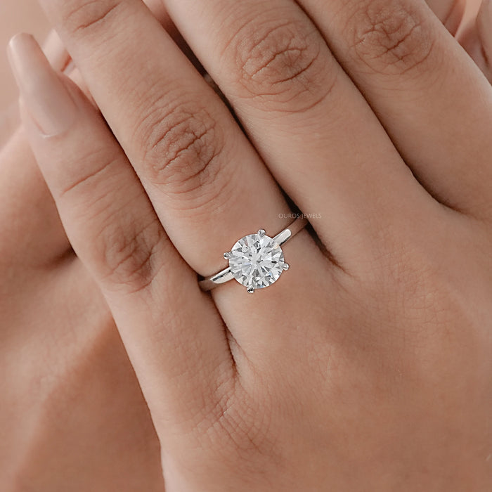 igi certified round cut lab diamond engagement ring on model's hand