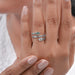 baguette and pear cut lab diamond spiral colored engagement ring on model's finger