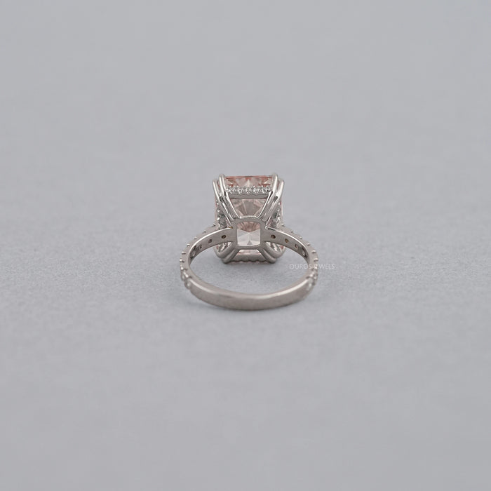 back view of pink radiant-cut diamond double-prong solitaire accent engagement ring