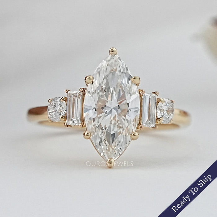 front view of marquise and baguette cut diamond five stone engagement ring