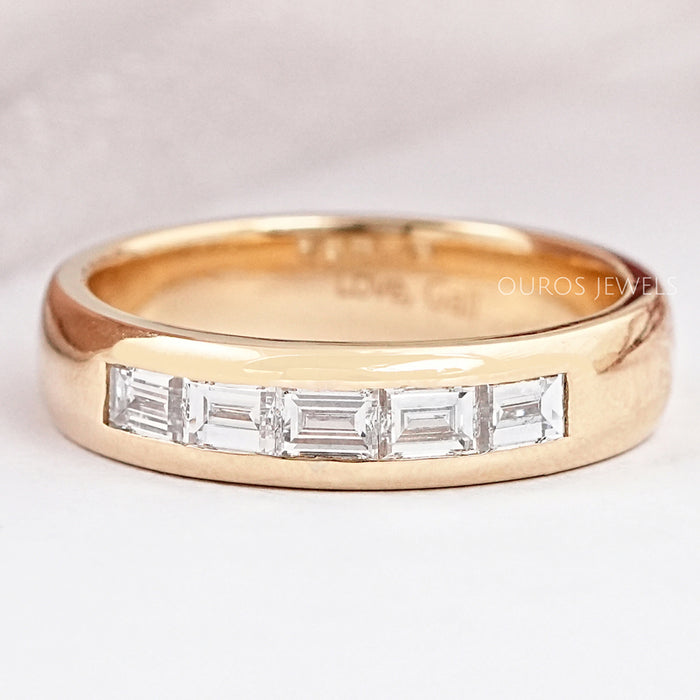 front view of baguette cut lab diamond yellow gold men's wedding band
