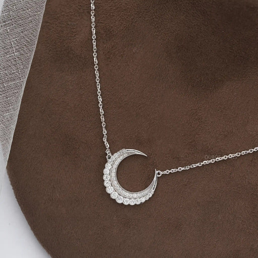 side view of round shape diamond milgrain bezel set moon pendant necklace