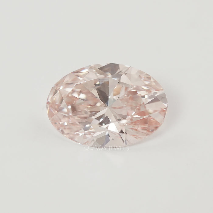 front view of fancy intense oval cut pink lab grown diamond loose