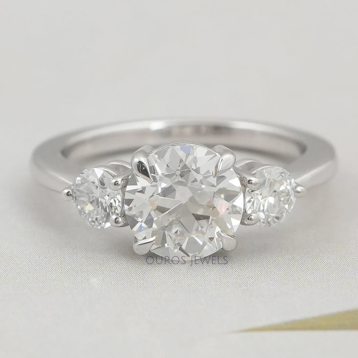 front view of old european round cut diamond three stone engagement ring