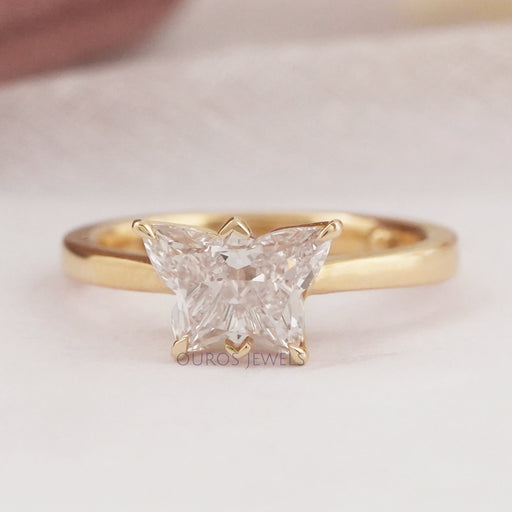 front view of pink butterfly shape lab diamond solitaire proposal ring