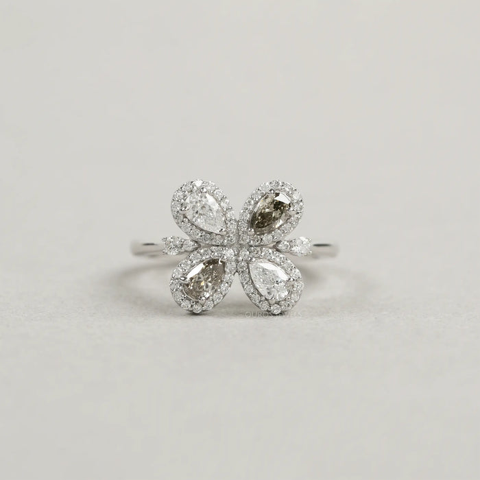 Einzigartiger floraler Ring mit Oliven- und Birnenschliff und Halo-Lab-Diamant