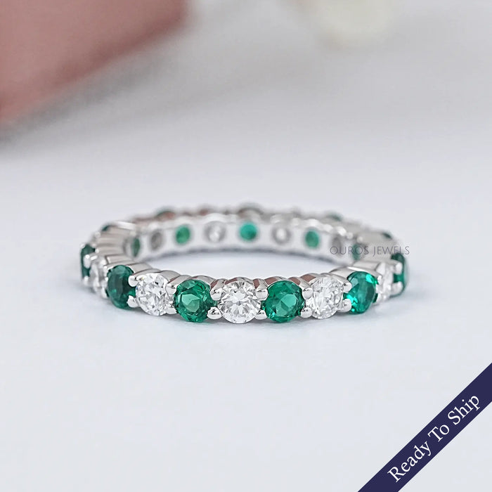 Emerald Gemstone And Round Diamond Wedding Band
