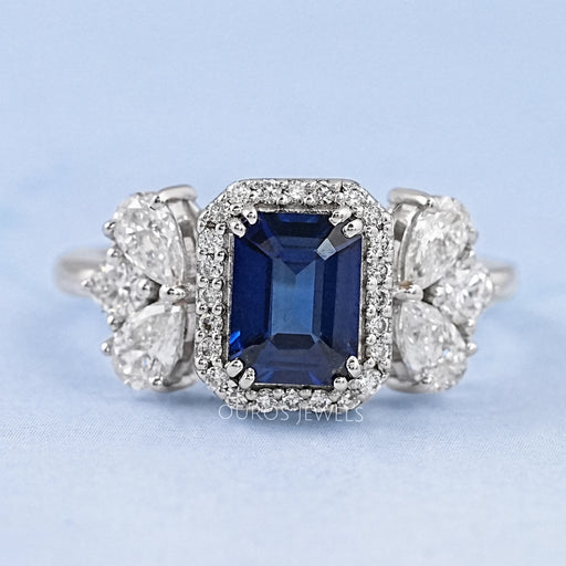 blue sapphire emerald diamond engagement ring  with halo accent's front view