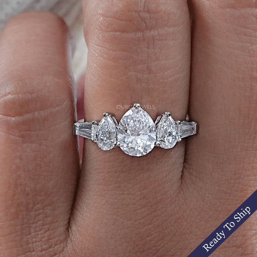 front view of pear cut lab diamond five stone engagement ring in white gold band