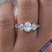 front view of pear cut lab diamond five stone engagement ring in white gold band