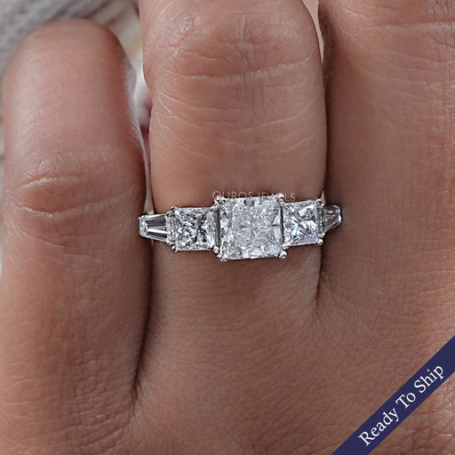 front view of princess cut lab diamond five stone engagement ring in finger