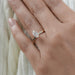marquise cut diamond solitaire engagement ring with prong setting in finger
