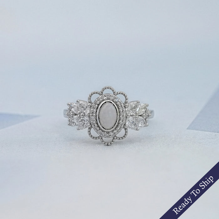 Opal Oval Cut And Halo Diamond Floral Engagement Ring