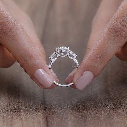 oval cut lab diamond three stone engagement ring's close view