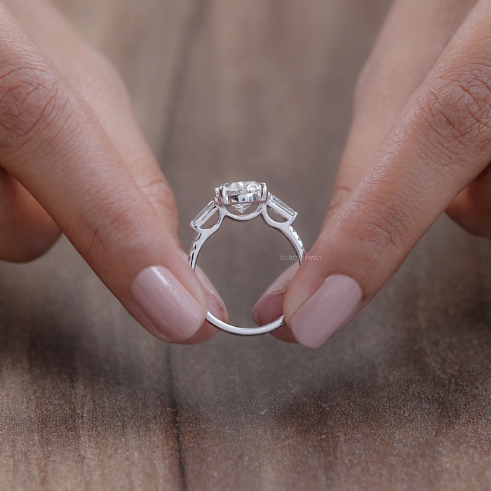 oval cut lab diamond three stone engagement ring's close view