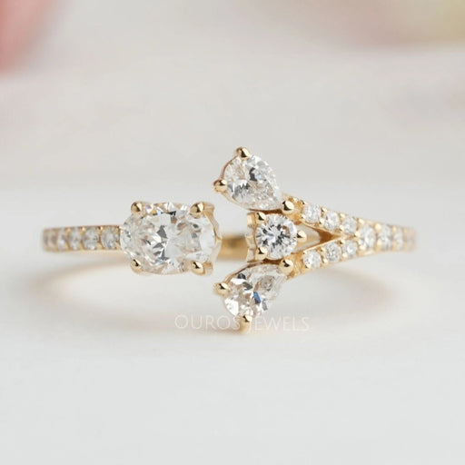 front view of oval-cut lab-grown diamond open cuff wedding band on fabric