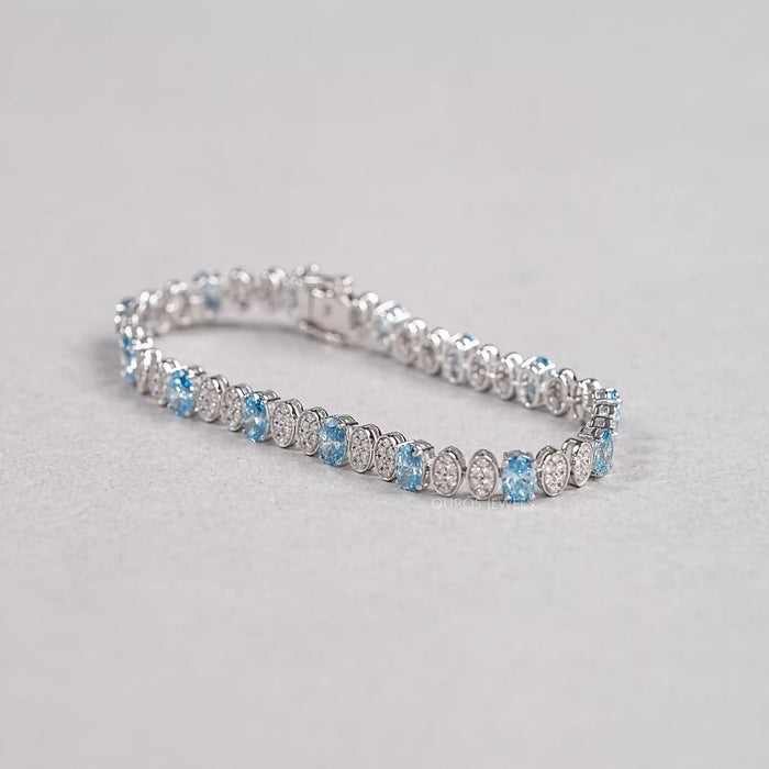 Alternating Blue Oval & Round Diamond Tennis Bracelet