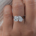 front view of pear and cushion-cut diamond hidden halo toi et moi engagement ring