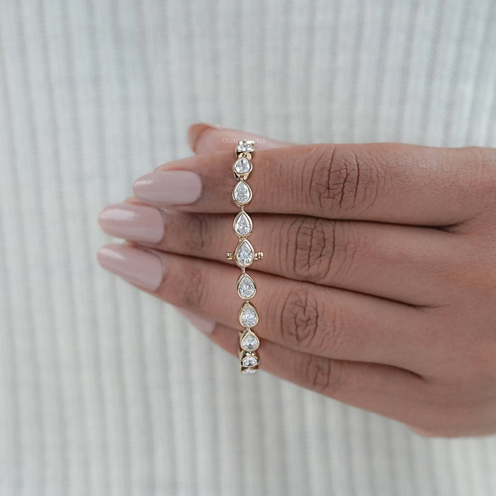Bezel Set Pear Cut East West Set Tennis Bracelet