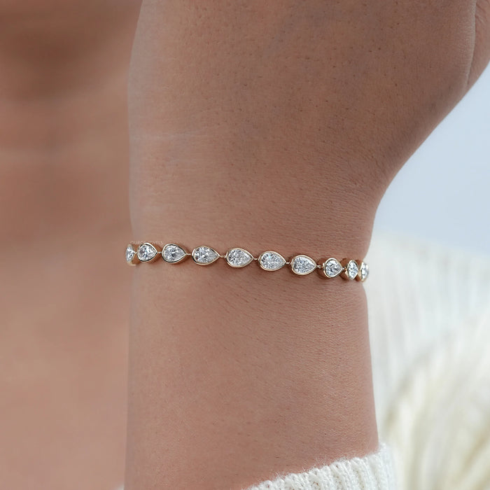 Bezel Set Pear Cut East West Set Tennis Bracelet