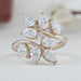 front view of pear-cut lab diamond leaf design cluster engagement ring