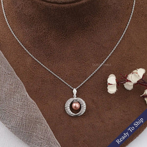 Pearl And Diamond Halo Pendant